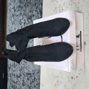 Black ankle boots with a heel